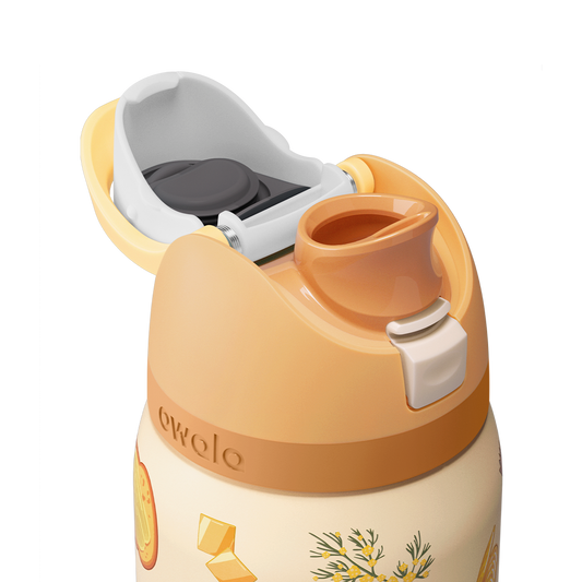 Owala FreeSip 32oz in Brunch Bunch, close-up with the flip cap open showing the peach FreeSip spout