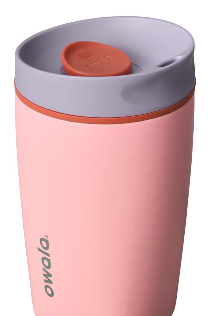 Owala SmoothSip Slider 12oz in Sugar High, close-up of gray lid with orange slider button and accent ring above soft pink body